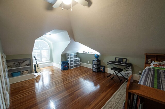 2108 Harrison Ave, Beaumont, TX 77701 - bedroom with wood finished floors, lofted ceiling, and ceiling fan