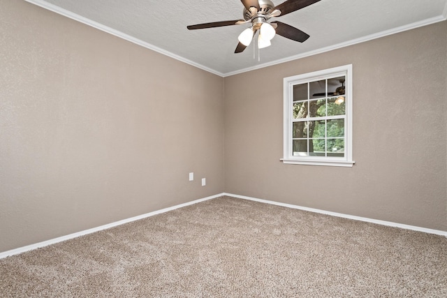 empty room featuring carpet flooring, ceiling fan, a textured ceiling, and ornamental molding