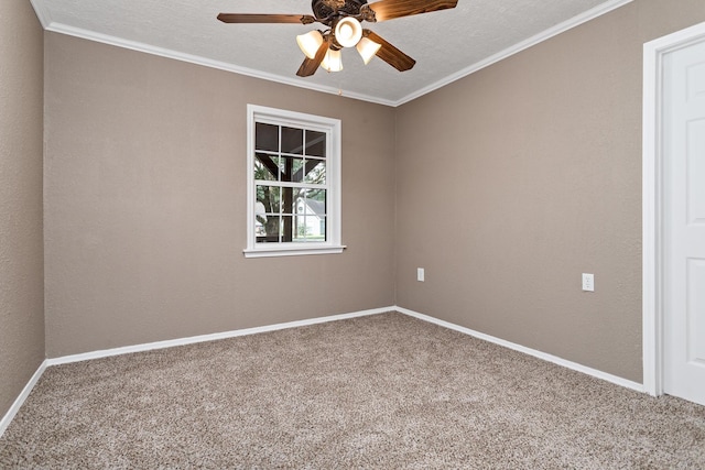 empty room featuring carpet flooring, ceiling fan, ornamental molding, and a textured ceiling