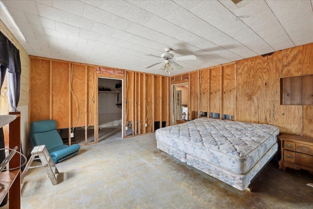 2432 Wespine Dr, Beaumont, TX 77707 - bedroom with wood walls and a ceiling fan