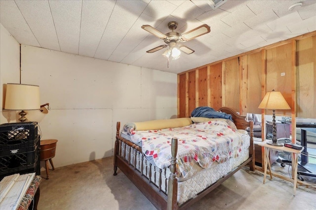 2432 Wespine Dr, Beaumont, TX 77707 - bedroom featuring unfinished concrete floors and a ceiling fan