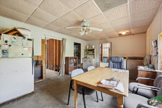 2432 Wespine Dr, Beaumont, TX 77707 - dining area with ceiling fan, a desk, and a drop ceiling