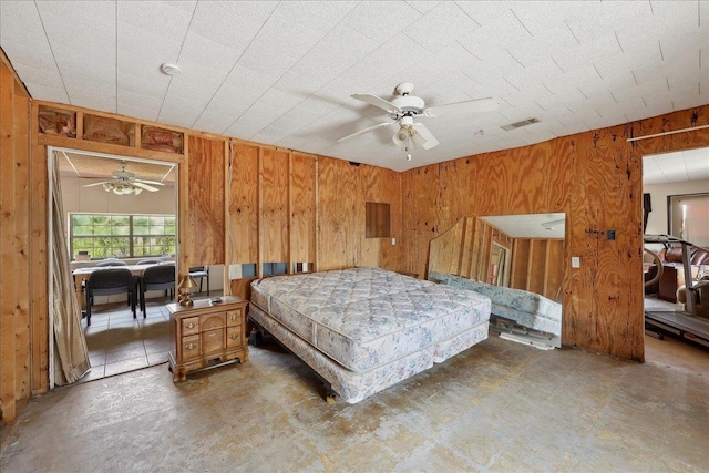 2432 Wespine Dr, Beaumont, TX 77707 - bedroom with wood walls and a ceiling fan