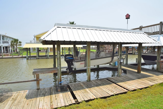 dock area featuring a water view