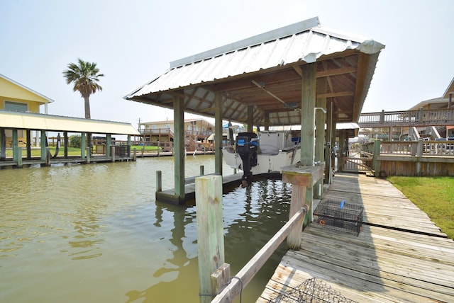 view of dock with a water view