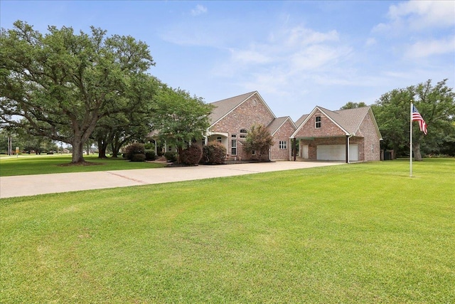 8185 Dawn Dr, Beaumont, TX 77705 - view of front of home featuring brick siding, a front lawn, concrete driveway, and a garage