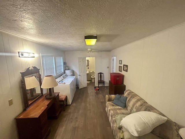 104 Hornbeam Dr, Village Mills, TX 77663 - living room featuring wood finished floors, independent washer and dryer, and a textured ceiling