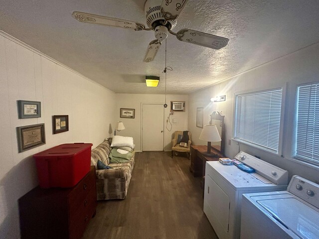 104 Hornbeam Dr, Village Mills, TX 77663 - laundry area featuring washer and dryer, dark wood-style flooring, a ceiling fan, a textured ceiling, and a wall mounted AC