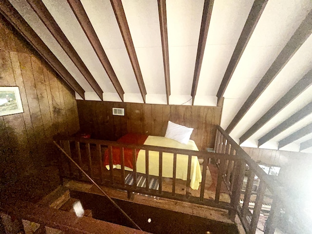 104 Hornbeam Dr, Village Mills, TX 77663 - stairs featuring wood walls and vaulted ceiling