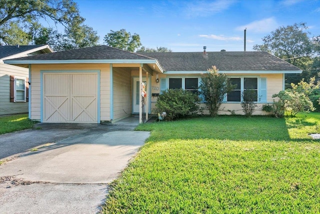 ranch-style home with a front yard and a garage