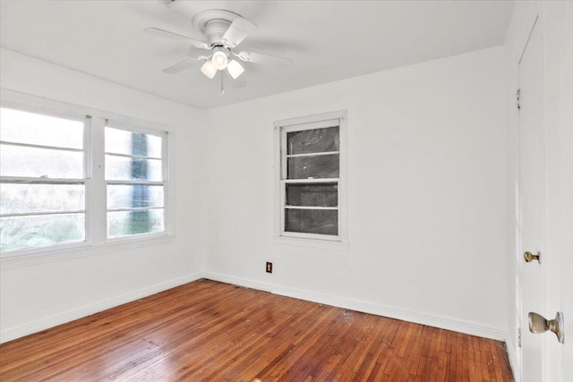 spare room featuring ceiling fan and wood-type flooring