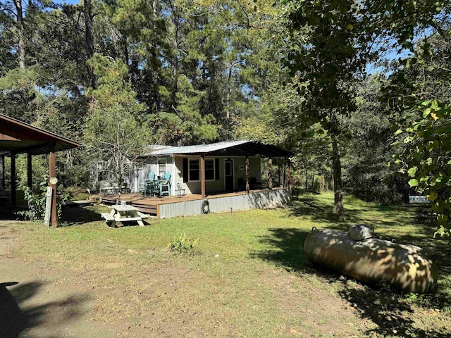 view of yard with a deck