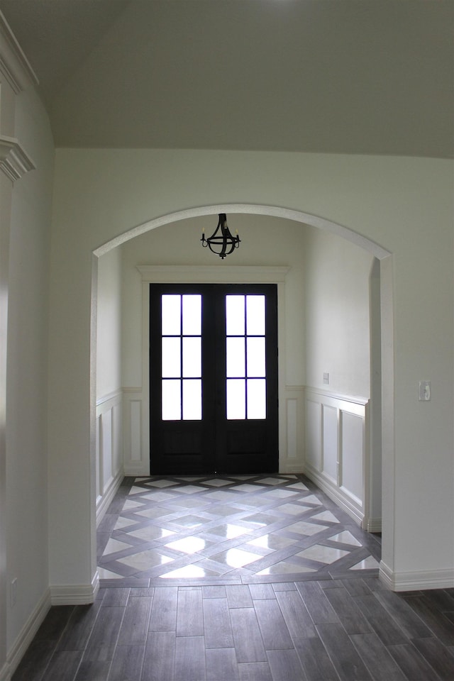 foyer entrance featuring french doors