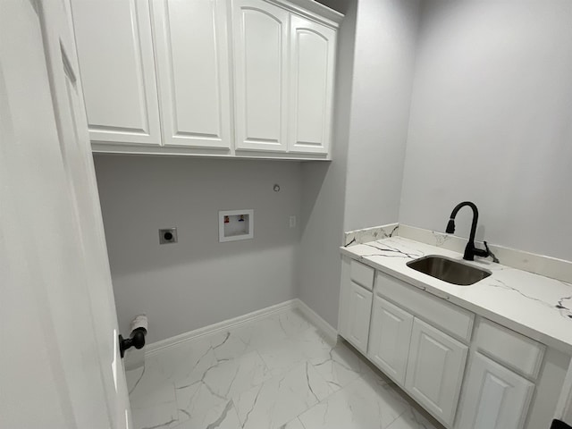 laundry room with hookup for an electric dryer, cabinets, sink, and washer hookup