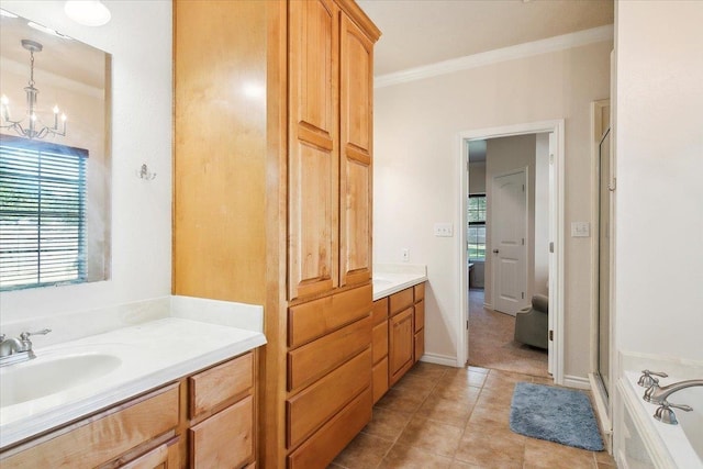 bathroom featuring vanity, crown molding, tile patterned flooring, separate shower and tub, and a chandelier