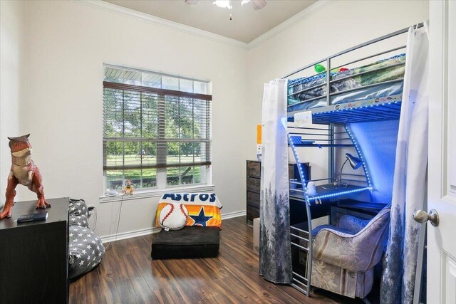 bedroom featuring dark hardwood / wood-style flooring and ornamental molding