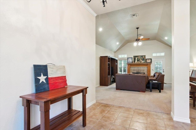 living room with ceiling fan and light carpet