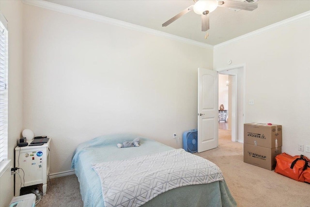 bedroom featuring ceiling fan, crown molding, and light carpet