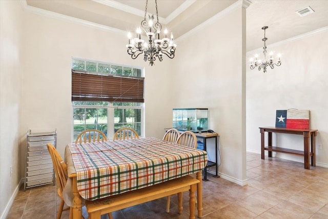 dining space featuring light tile patterned floors, crown molding, and a chandelier