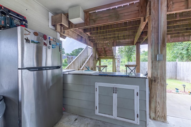 2315 Granger Dr, Bridge City, TX 77611 - view of patio featuring stairs and an outdoor bar