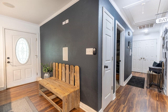 2315 Granger Dr, Bridge City, TX 77611 - foyer featuring wood finished floors, ornamental molding, and baseboards