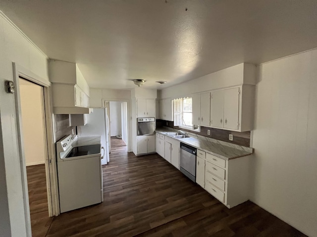 kitchen featuring white cabinetry, appliances with stainless steel finishes, sink, and dark hardwood / wood-style flooring