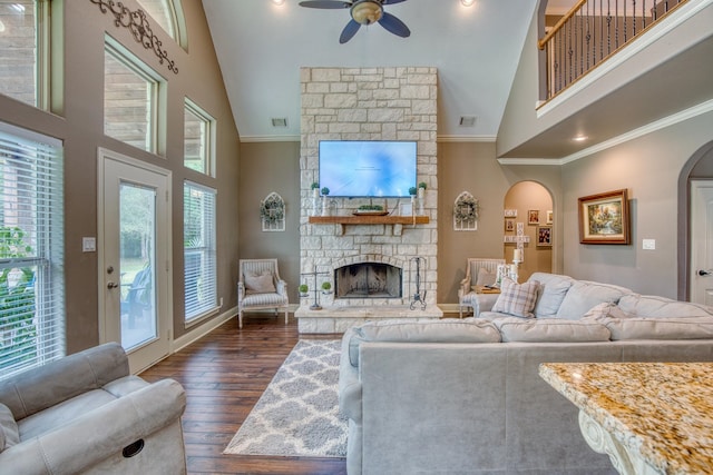 living room featuring high vaulted ceiling, a wealth of natural light, and ceiling fan