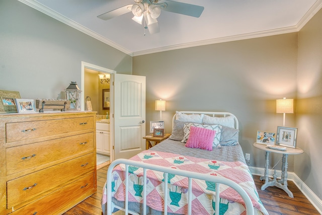 bedroom featuring ceiling fan, crown molding, ensuite bathroom, and dark hardwood / wood-style floors