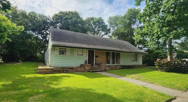 view of front of home featuring a front yard