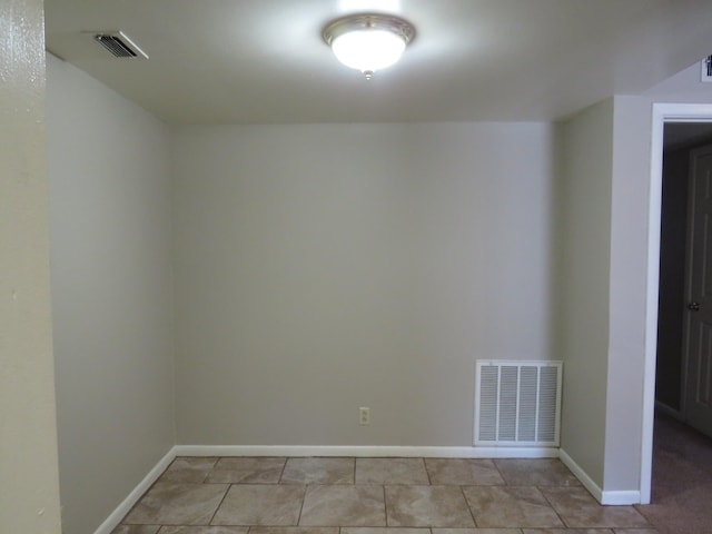 2345 Nall St, Port Neches, TX 77651 - spare room with baseboards and light tile patterned flooring