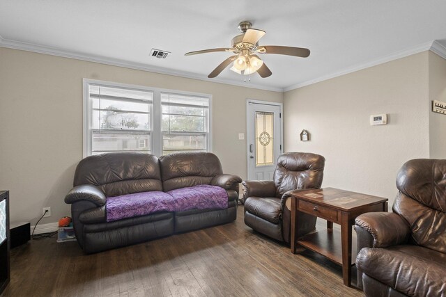 3449 Charles Ave, Groves, TX 77619 - living area featuring a ceiling fan, wood finished floors, and crown molding