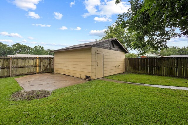 3449 Charles Ave, Groves, TX 77619 - view of outbuilding with a fenced backyard