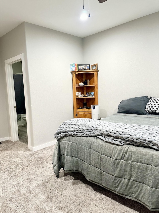 bedroom featuring carpet floors, baseboards, and ceiling fan