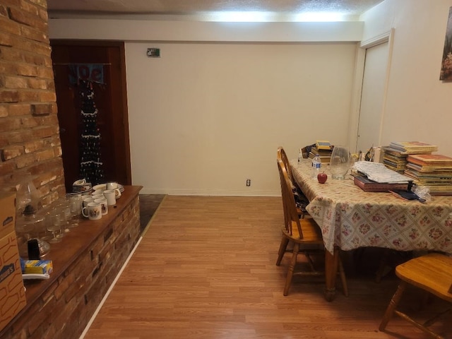 dining area featuring hardwood / wood-style flooring