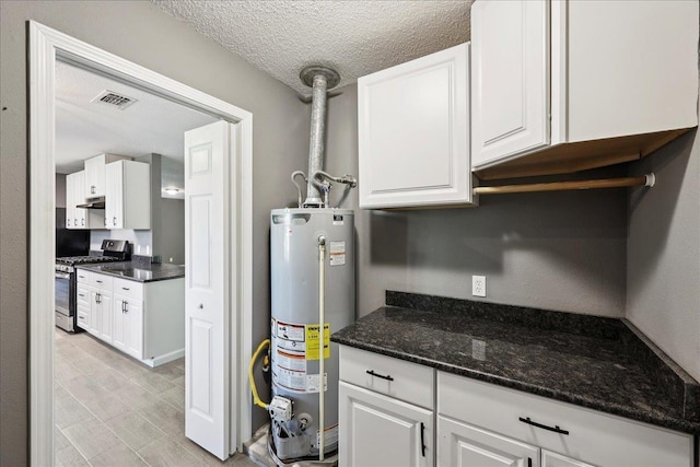 2024 International Ave, Orange, TX 77632 - utility room featuring water heater