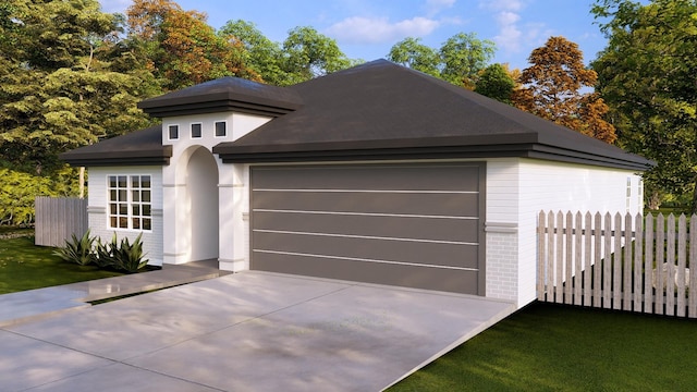 view of front of home with a garage