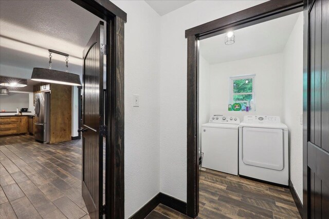 1185 Pinecrest St, Vidor, TX 77662 - laundry area with washer and dryer, dark wood-style floors, and baseboards