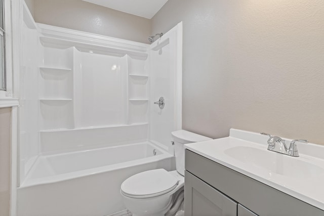 full bathroom with vanity, shower / bathtub combination, and toilet