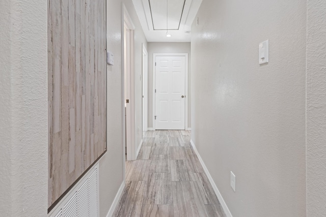 hallway featuring light hardwood / wood-style flooring