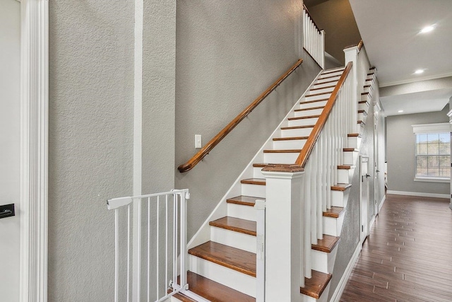 stairs with hardwood / wood-style flooring