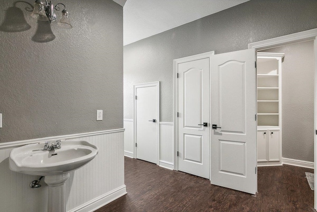 bathroom with wood-type flooring