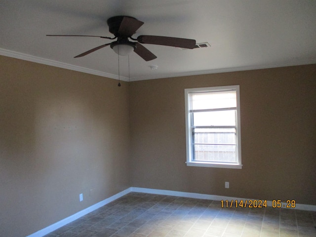 spare room with ceiling fan and ornamental molding