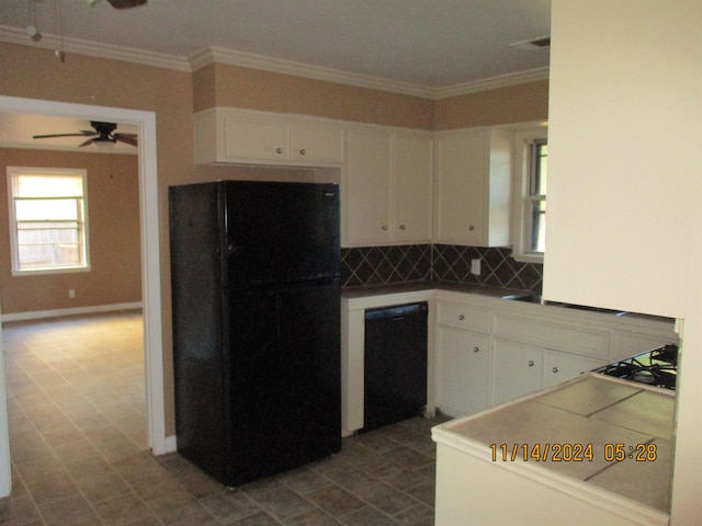 kitchen featuring white cabinetry, ceiling fan, tasteful backsplash, black appliances, and ornamental molding