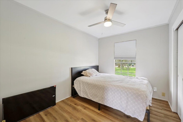 5150 Stardust Dr, Beaumont, TX 77706 - bedroom with wood finished floors and a ceiling fan