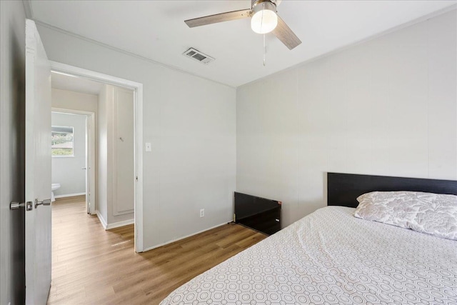 5150 Stardust Dr, Beaumont, TX 77706 - bedroom featuring wood finished floors and a ceiling fan