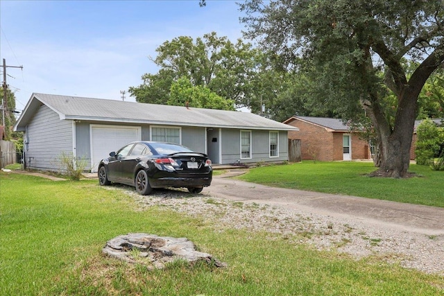 5150 Stardust Dr, Beaumont, TX 77706 - single story home with a garage, a front yard, and driveway
