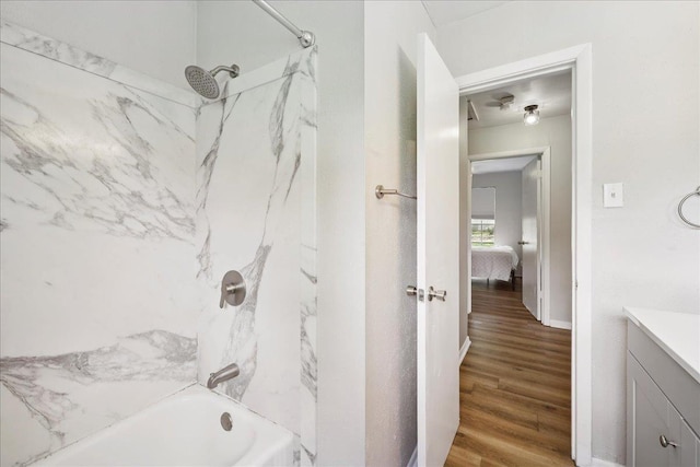 5150 Stardust Dr, Beaumont, TX 77706 - full bathroom featuring vanity, tub / shower combination, wood finished floors, and ensuite bathroom