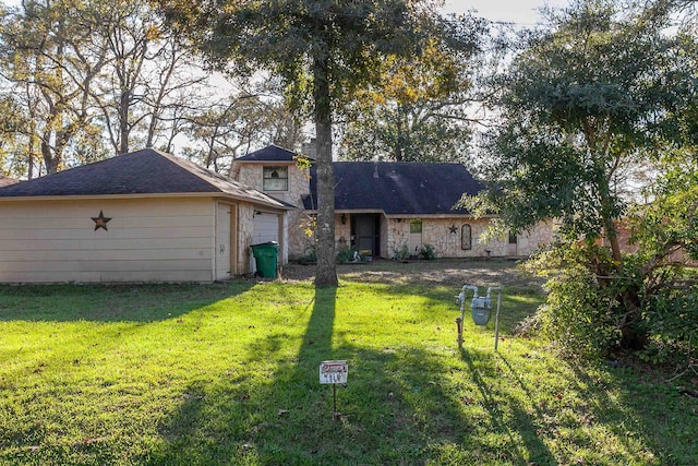 back of property featuring a lawn