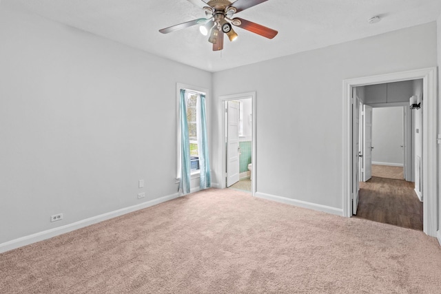 2695 Sandlin St, Beaumont, TX 77707 - unfurnished bedroom featuring carpet floors, baseboards, a ceiling fan, and ensuite bath