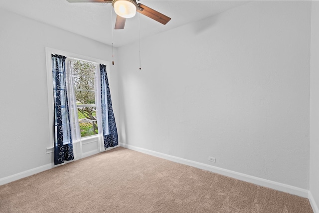 2695 Sandlin St, Beaumont, TX 77707 - carpeted empty room with a ceiling fan and baseboards
